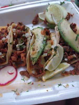 Pastor tacos and a chorizo/asada with avocado