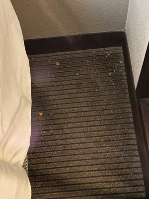 Crumbs left on the side of my cousin's bed