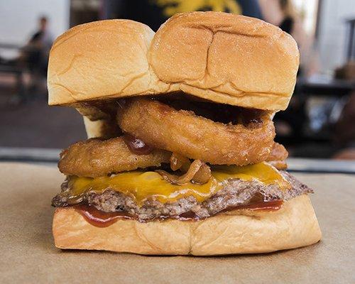 RINGER – cheddar cheese, smoked bacon, onion rings, bbq sauce