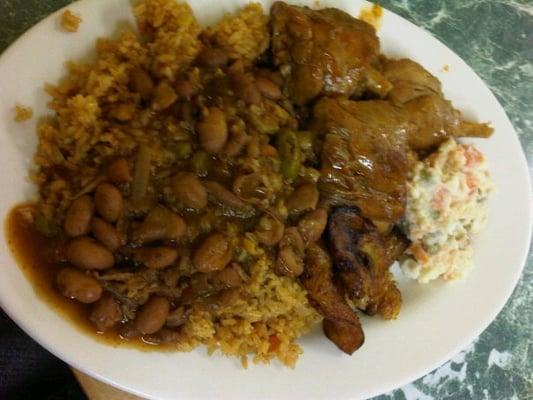 yellow rice with chicken, beans, plantains, and potato salad. mMmmMmm