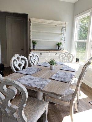 Refinished table by MONA,  chairs and china cabinet with hutch