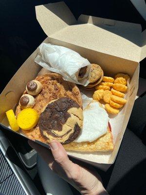 Pineapple cookies, peanut butter chocolate cookie, sanddabs, cheese bites, pecan crisp, cherry turnover, chocolate cream horn