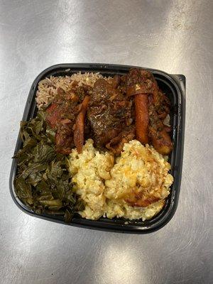 Stew chicken Mac and cheese greens and rice