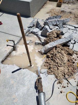 Leak and broken cement. After 4 months they are fixing it.