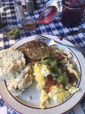 Biscuit, eggs, sausage, homemade ham. The outside is rustic but it is very quaint and clean.