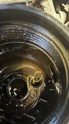 The oil filter casing the yellow circles show the damage