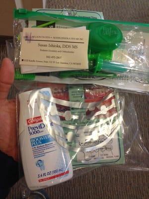 My dental packet after my appointment with floss, special toothpaste, traveling tooth brush and more :-)