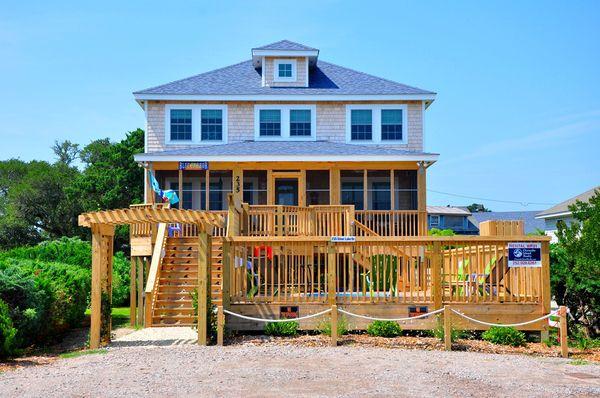 Ocracoke Island Realty waterfront home with pool and boat dockage on Silver Lake Harbor.  Blue Harbor cottage.