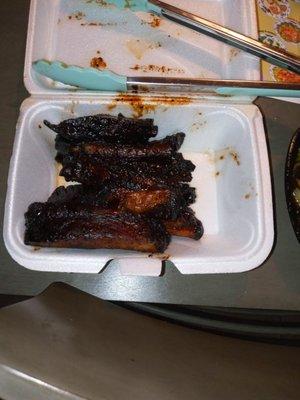 These are the burnt ribs they charged us for it's been a issue with our last four orders.