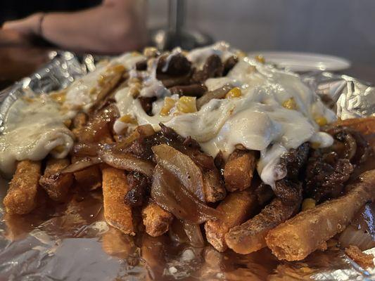 Bulgogi + corn cheese + fries, so yummy but you have to ask for it it's not on the menu to order like this. Super yummy tho! $20!