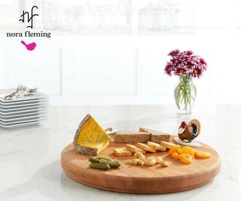 Nora Fleming interchangeable serving ware allows you to have one platter or cheese board for many occasions.