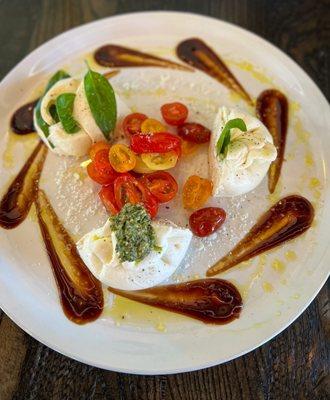 CAMPIONATIORE * A sampling of all burrata, and caprese. Served with crostini