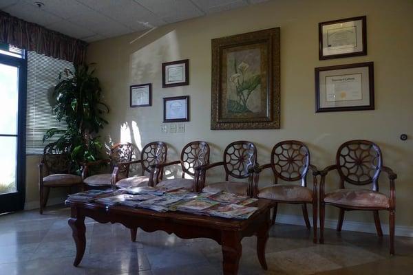 Waiting room, with framed diplomas mounted on the wall (from her old office on Warner Ave)