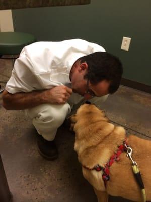 Dr. K. and our puggle Beckett deep in conversation