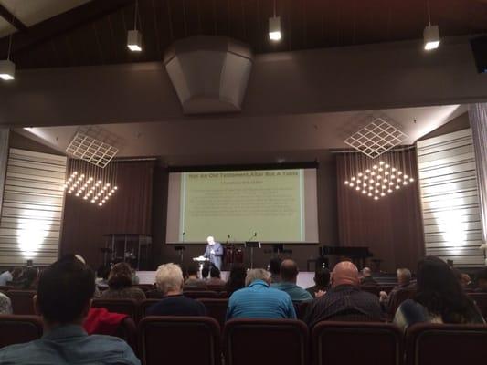 Pastor Jess Strickland teaching from the NT in the early service.