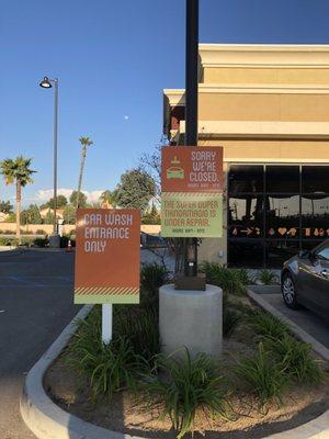 Sign and cones showing closed