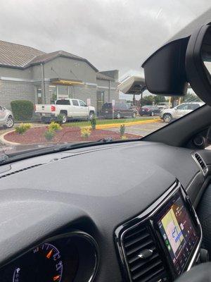 Cars parked in the drive through for over 10 minutes