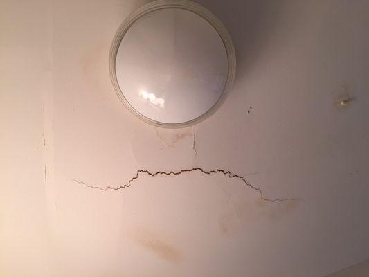 The cracks that developed and I reported for over a month before the ceiling caved in.