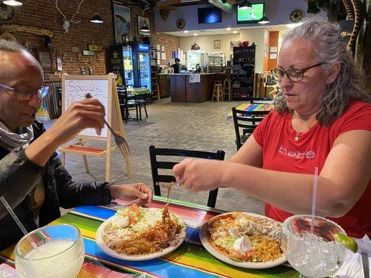 Sharing green chicken enchiladas and cheese enchiladas