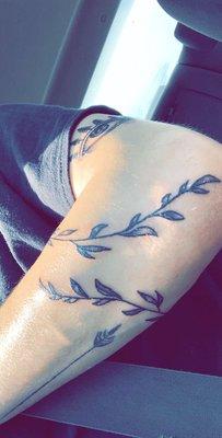 Tattoos:eye, and vines