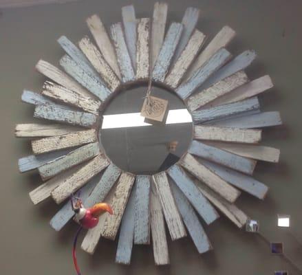 Three foot round mirror made in Alabama from reclaimed wood.