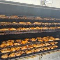 Smoked Chicken getting ready for a 1000 person buffet.  We have 2 smokers on trailers that in total can hold 1200 pieces of chicken quarters