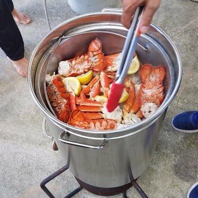 Lobster tails, alaskan snow crab, jumbo shrimp  signature seafood boil