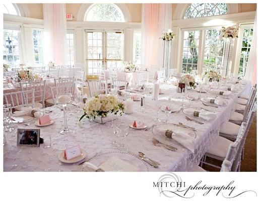 Mimi & Co 
Kings tables - White Iris overlays over white linens
Square tables - White LUXE overlays over blush Dupioni linens