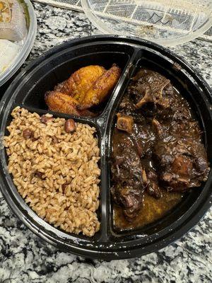 Oxtail, rice and peas and Fried Plantain