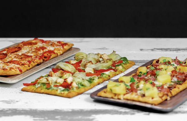 Discover sneakybird's mouthwatering flatbreads, made with fresh ingredients and bursting with unique flavors.