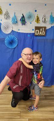 Jacob with Grandpa at his Day Care Graduation