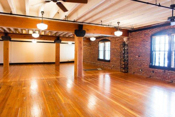 Love the brick wall and wood beams!