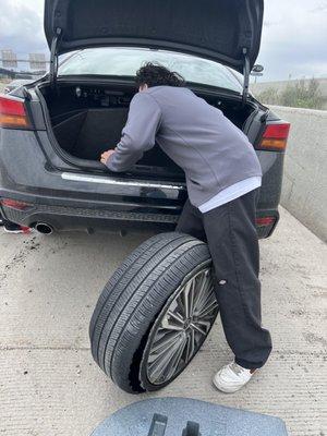 Look at that shredded tire! This man and his son from Victor's Tires saved the day. Thank you!