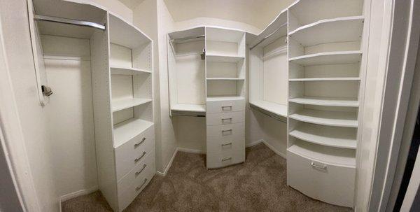 Our master closet *AFTER* (panorama is a bit funky)