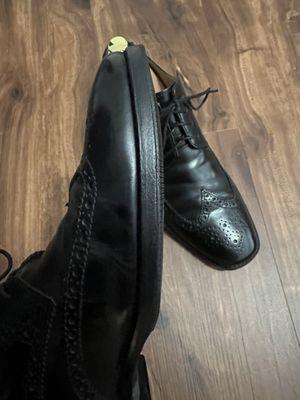 1/2 sole and rubber sole-saver detail on a pair of Cole Haan black Brogues.