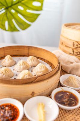 Savory soup filled dumplings made from Berkshire and Duroc Pork.