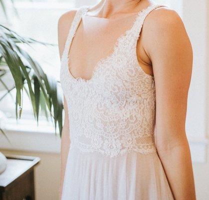 Every motif of lace was hand stitched to create this beautiful, perfectly fitted bodice