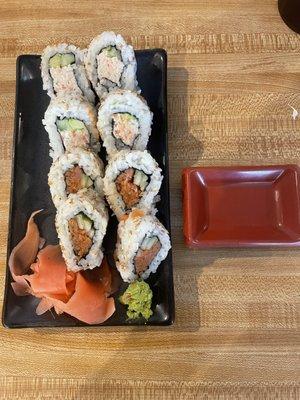 Half & Half roll of California roll and spicy tuna roll.