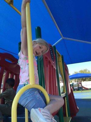 My daughter on the beautiful TLE Brushy Creek Playground!