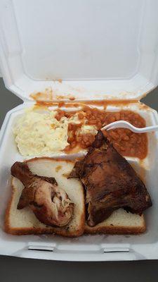 Legquarter dinner with beans, potato salad and bread.