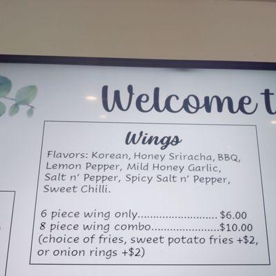 Close up of wings on menu board