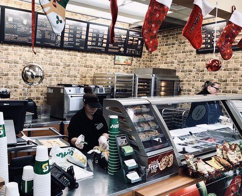 Inside the super SUBWAY, showing a superlative employee.