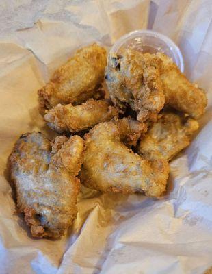 Six crispy wings, $7