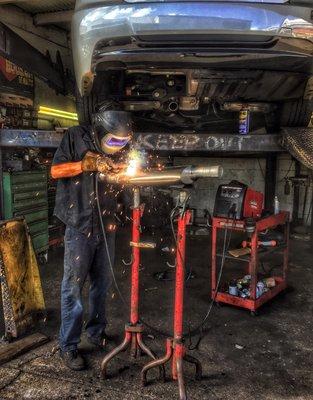 Rick adding his custom work on my exhaust