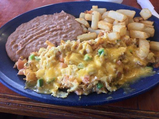 Migas. Sooo cheesy melty delish!