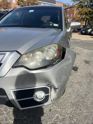 Car with broken bumper