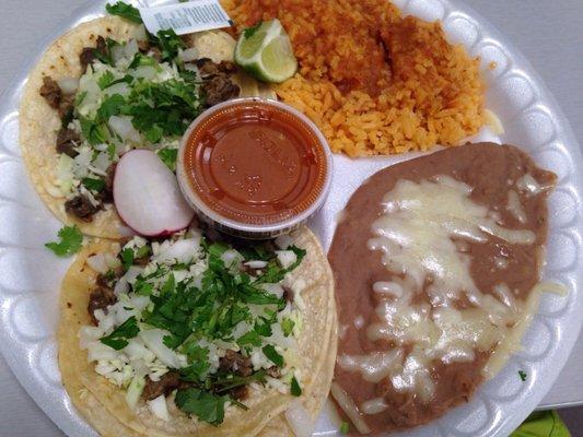 Tacos with rice and beans.