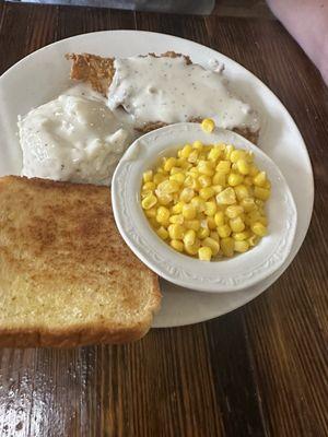 Chicken fried steak, mashed potatoes, corn and Texas toast