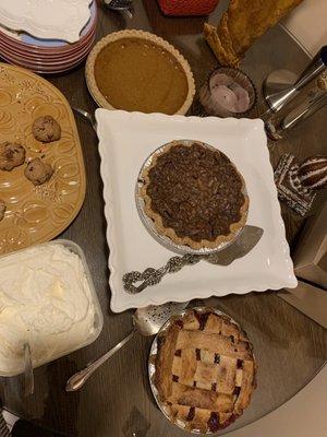 From top: pumpkin pie, pecan pie, cherry pie