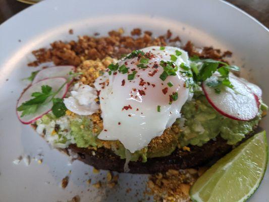 Avocado toast with egg and chorizo